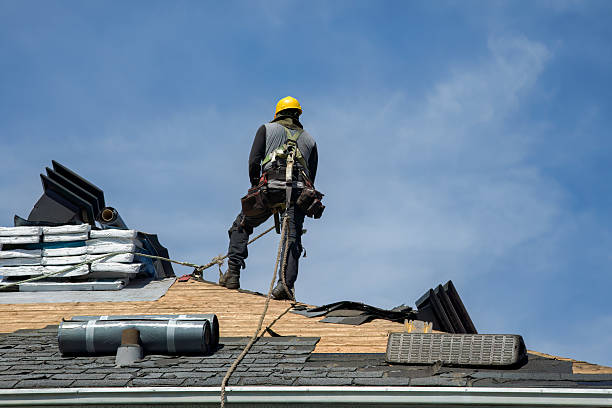 Professional Gutter Installation technician working in Russell, MA